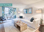 Thumbnail 11 of 24 - A living room with a white couch and a coffee table at The Meadows Apartments, Culver City , CA 90230