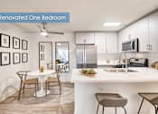 Thumbnail 7 of 24 - A renovated one bedroom apartment with a kitchen and dining area at The Meadows Apartments, Culver City , CA 90230