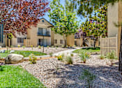 Thumbnail 14 of 16 - A modern house with a well-maintained garden in front.