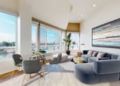 Thumbnail 9 of 34 - A modern living room with a view of a marina at Esprit Marina del Rey, 90292