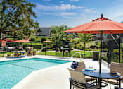 Thumbnail 6 of 13 - Pool-side patio  at Pleasanton Heights, California, 94566