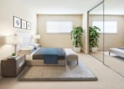 Thumbnail 6 of 12 - A bedroom with a bed, nightstand, and potted plants at Pleasanton Place, Pleasanton, CA, 94566