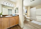 Thumbnail 5 of 12 - A bathroom with a vanity and a toilet at Pleasanton Place, Pleasanton, CA, 94566