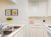 Thumbnail 7 of 16 - Kitchen at Village Pointe Apartments, Northridge, 91325