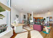 Thumbnail 18 of 34 - A living room with a pink couch and a white coffee table at Esprit Marina del Rey, 90292