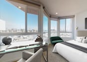 Thumbnail 12 of 34 - A bedroom with a large bed and a view of the city at Esprit Marina del Rey, 90292