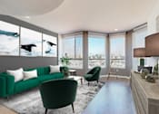 Thumbnail 13 of 34 - A living room with a green couch and a blue rug at Esprit Marina del Rey, 90292
