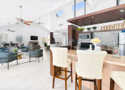 Thumbnail 6 of 27 - Clubhouse Kitchen at Bookstone and Terrace Apartments in Irving, Texas