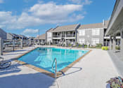 Thumbnail 26 of 37 - Our sparkling swimming pool surrounded by apartments at The Oasis apartments in Bossier City, LA