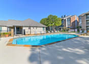 Thumbnail 11 of 27 - Sparkling Swimming Pool at Bookstone and Terrace Apartments in Irving, Texas