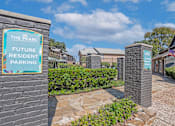 Thumbnail 21 of 23 - A sign for The Pearl Apartments Future Resident Parking is displayed.