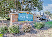 Thumbnail 4 of 23 - Property signage at the entrance for The Pearl apartments in Shreveport, LA