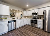 Thumbnail 10 of 17 - Fully Equipped Kitchen Includes Frost-Free Refrigerator, Electric Range, & Dishwasher at Le Provence at the Dominion, Fresno