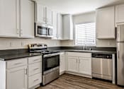 Thumbnail 14 of 17 - Fully Furnished Kitchen With Stainless Steel Appliances at Le Provence at the Dominion, Fresno, CA