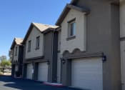 Thumbnail 2 of 8 - Exterior Building with Garages