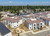 Thumbnail 17 of 18 - an aerial view of a large group of houses
