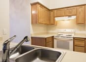 Thumbnail 9 of 22 - Kitchen with Pantry at Park Ridge Apartments, Fresno