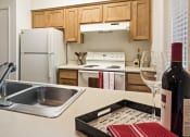 Thumbnail 18 of 22 - Fully Equipped Kitchen at Park Ridge Apartments, Fresno, CA 93711