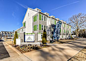 Thumbnail 1 of 13 - A building with a sign that says "Town at Eastland".