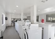 Thumbnail 16 of 50 - 2420 Laundry Facility on site , shows washers and dryers