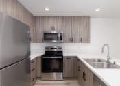 Thumbnail 23 of 50 - upgraded kitchen with ss appliances