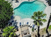Thumbnail 16 of 20 - Aerial view of resort style pool at Skyline at Barton Creek Apartments, Austin, TX