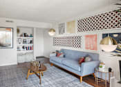 Thumbnail 3 of 20 - Modern living room with decorative wall art at Skyline at Barton Creek Apartments, Texas