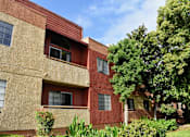 Thumbnail 2 of 18 - Red apartment buildings