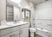 Thumbnail 12 of 12 - a bathroom with a sink toilet and a shower at Parks Residential - Denver, Centennial, CO 80111