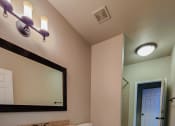 Thumbnail 19 of 54 - Bathroom with vanity and travertine  in Elmwood Floor plan