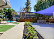 Thumbnail 9 of 24 - covered patio and pool at The Boardwalk