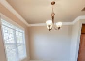 Thumbnail 14 of 54 - dining area with travertine in Briarwood floor plan