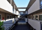 Thumbnail 4 of 16 - Second story view of the parking garage below