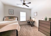 Thumbnail 8 of 48 - A Small Bedroom at Midtown Sam Houston Apartments, Huntsville, 77340