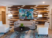Thumbnail 10 of 65 - a living room with a couch and a table  at Parks Residential - Richardson, Richardson