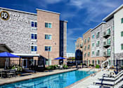 Thumbnail 2 of 65 - our apartments have a large pool and lounge chairs at Parks Residential - Richardson, Richardson, 75082