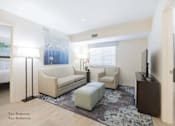 Thumbnail 26 of 65 - a living room with a couch and two chairs and a television at Parks Residential - Richardson, Texas