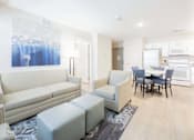 Thumbnail 52 of 65 - Living Room With Dining Area at Parks Residential - Richardson, Texas, 75082