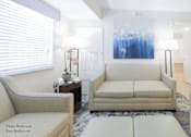 Thumbnail 53 of 65 - a living room with a couch and a table at Parks Residential - Richardson, Richardson, 75082