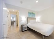Thumbnail 57 of 65 - a bedroom with a large white bed and a white at Parks Residential - Richardson, Richardson, 75082