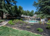 Thumbnail 17 of 26 - View of gated community pool from a distance