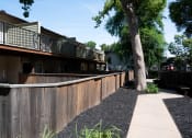 Thumbnail 29 of 34 - View of private patio/balcony and sidewalk winding through