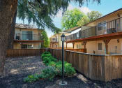 Thumbnail 25 of 34 - View of private patio/balcony and trees providing shade