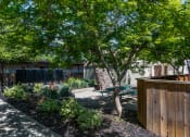 Thumbnail 17 of 34 - View of courtyard with picnic table, mail area, and nice landscaping and trees