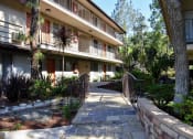 Thumbnail 16 of 23 - the walkway up to the apartment building