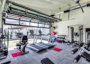 Thumbnail 13 of 24 - 24 hour indoor fitness center at The Premiere at Dana Park, Mesa, AZ