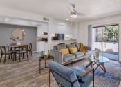 Thumbnail 15 of 36 - a living room with a couch and a table  at Glen Brae, Glendale, Arizona