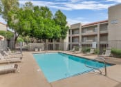 Thumbnail 5 of 36 - our apartments have a swimming pool with chairsat Glen Brae, Glendale, AZ, 85301