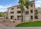 Thumbnail 33 of 36 - our apartments have a spacious courtyard with grass and trees at Glen Brae, Arizona, 85301