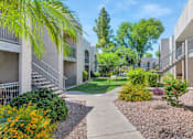 Thumbnail 45 of 47 - Front Yard Green Lawn at Miramonte Apartments, Scottsdale, 85250